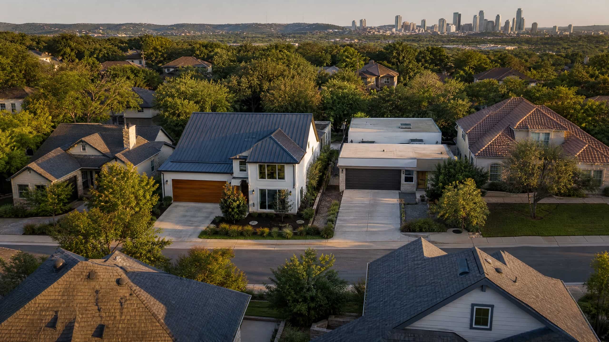 Austin Texas neighborhood showing multiple roof types including metal, shingle, and flat roofs